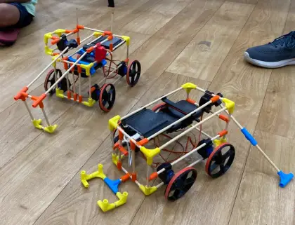 Two buggies on the wooden floor