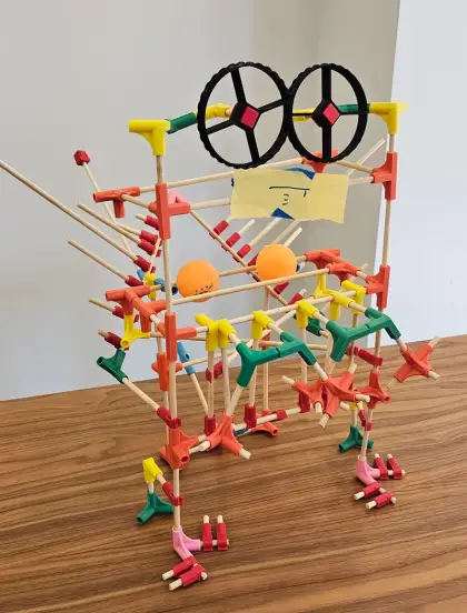 A ferris wheel built from sticks and connectors