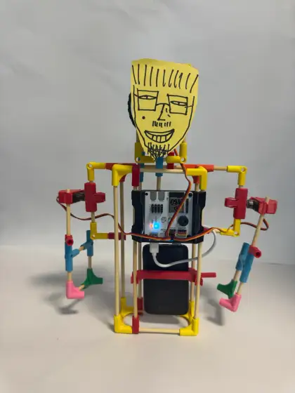 A humanoid with a drawn face and glasses