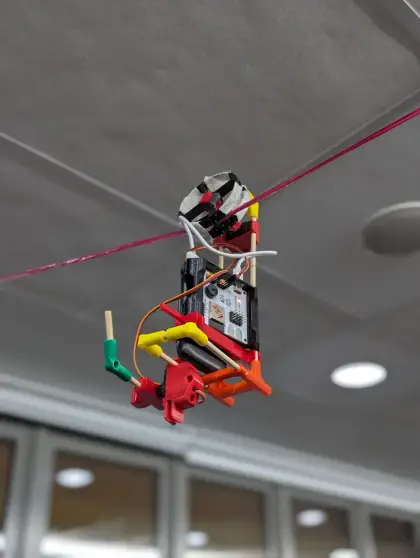 A robot riding the zipline