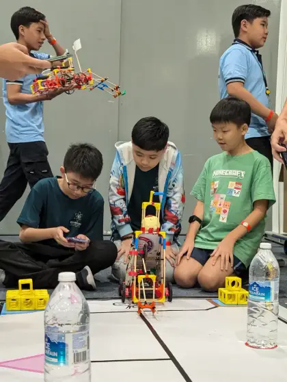 A team and their robot at the Games