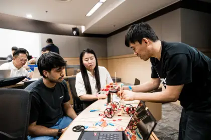 Engineers build robot cars at AI Engineer Singapore