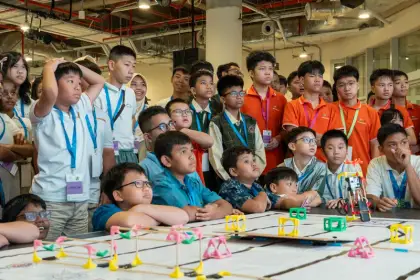 Gathered around the tabletop obstacle course