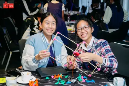 Laughing while they build at Girls Love Tech